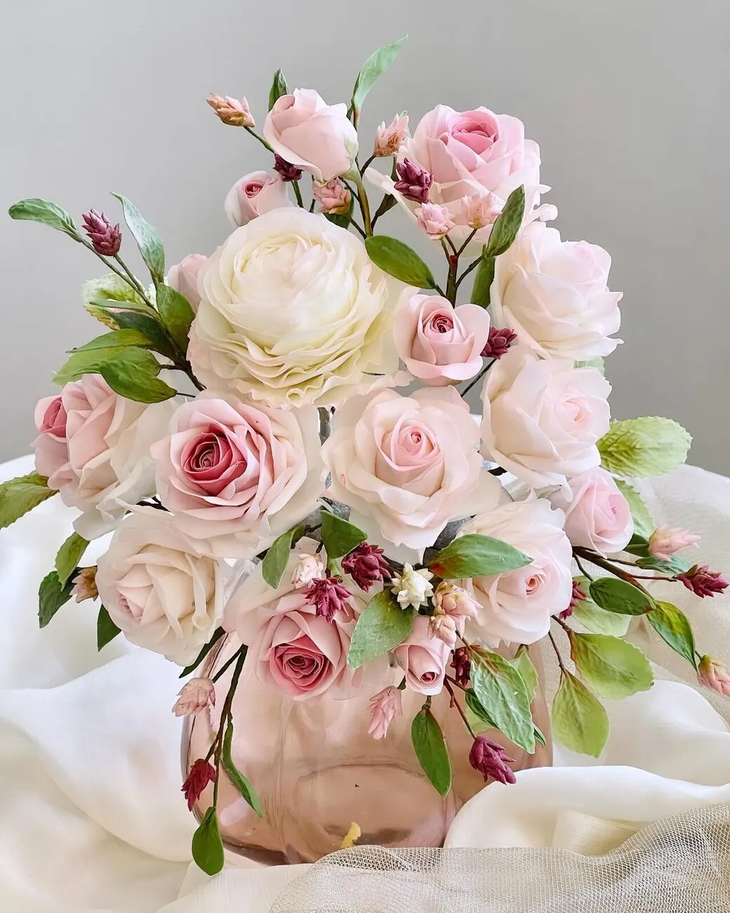 Cake with sugar flowers by Fainaz Milhan, 2024