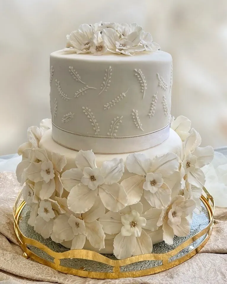 Wedding or engagement cake by Fainaz Milhan, 2024